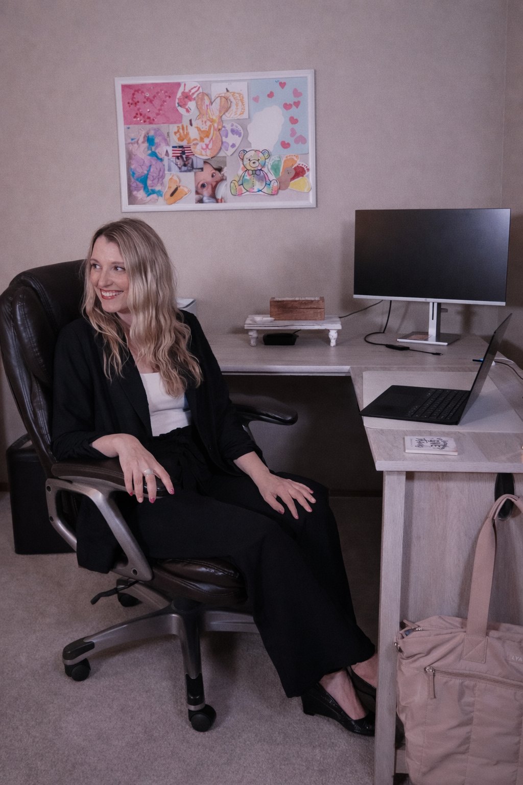 Ashley Jones at desk